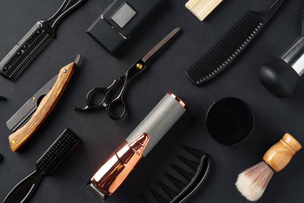 istock An Assortment of Professional Hairdressing Tools Laid Out on a Dark Surface 2137328681