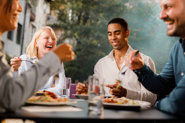 istock Happy business colleagues having lunch in a restaurant. 2137330798