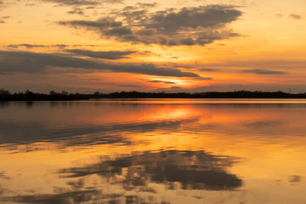 istock reflection of the sky in the lake at sunset 2137341302