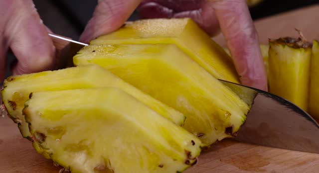 Sliced delicious ripe pineapple yellow, close up
