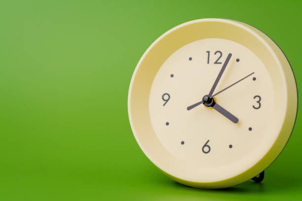 istock Modern alarm clock ticking, standing still time, time concept, time photography in studio. 2137353422