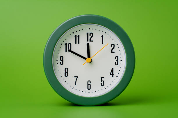 istock Modern alarm clock ticking, standing still time, time concept, time photography in studio. 2137353427