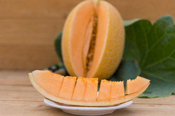 piece of fresh orange melon on the plate