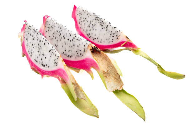 Dragon fruit in a section isolated on a white background.