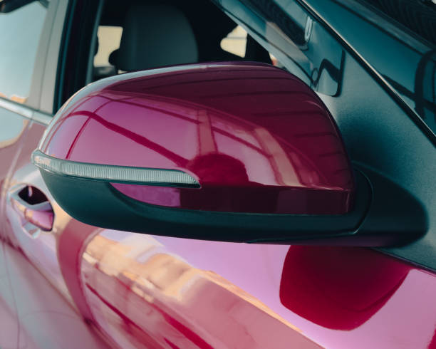 istock Mirror on a red car. Close-up 2137381824
