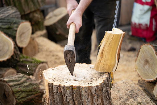 chopping wood with an ax close-up