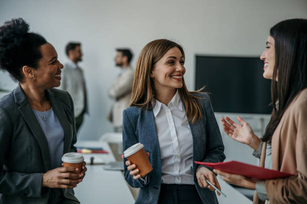 istock Diverse group of professional women engaged in conversation 2137384677
