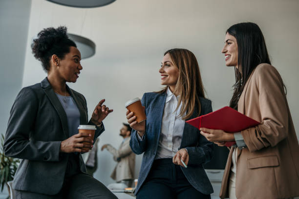 istock Diverse group of professional women engaged in conversation 2137384694