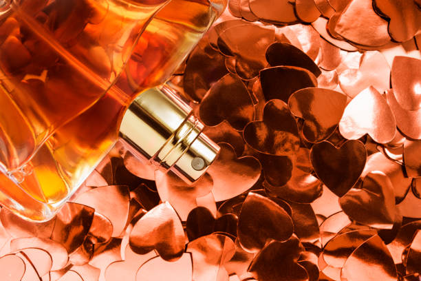 istock Perfume bottle on heart confetti 2137390012