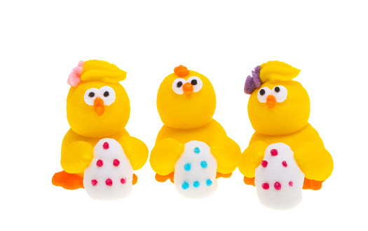 Easter decor sugar chickens isolated on white background