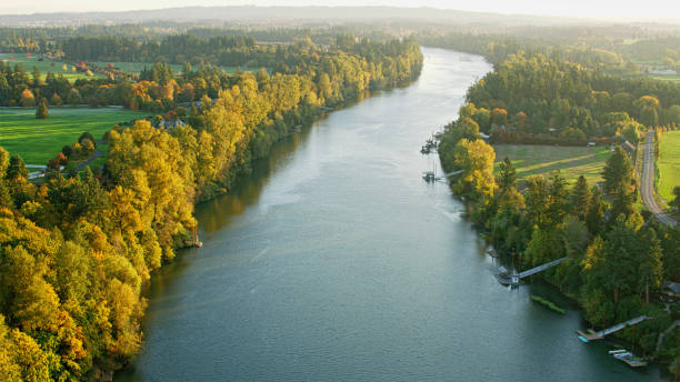 istock Scenic view of calm river on farm 2137427340