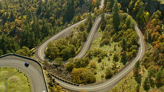 Aerial view of road winding below  Rowena Crest Viewpoint in  on sunny day, Oregon, USA.
