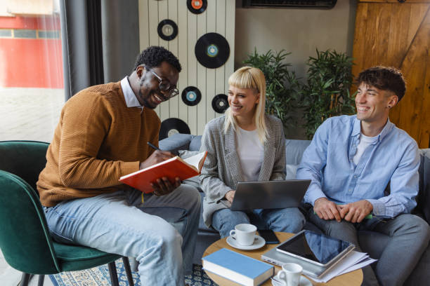 istock Diverse group of young coworkers working together in modern space 2137472554