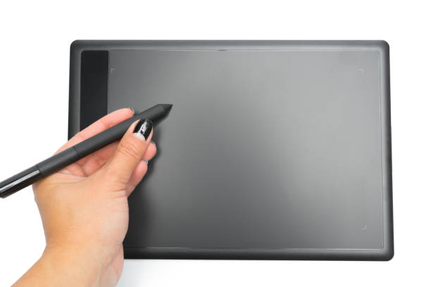 Graphic tablet with pen and hand for illustrators and designers, isolated on white background