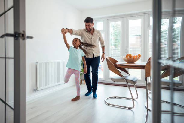 istock Young Girl Grooves with Dad 2137488233