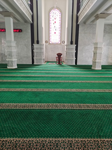The place where the muslim pray in a classic interior space of a mosque