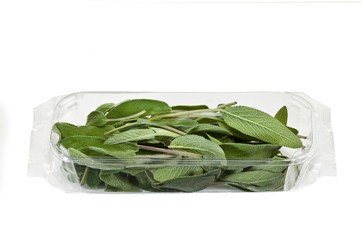 Salvia - common Sage - Isolated on White Background - plastic Package Wrapped in Clear Plastic - Top View, Macro Close Up