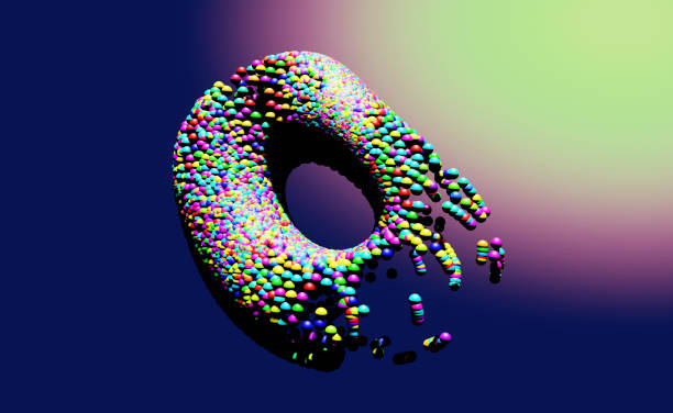 istock A donut-shaped object made of colorful particles deforms and collapses. 2137537133