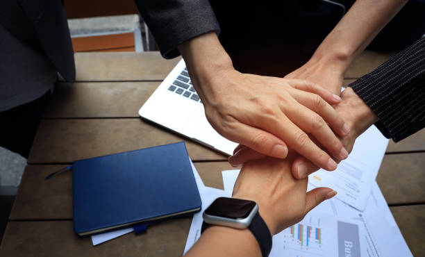 istock Teamwork Concept,Group of diversity people to greeting power tag team,Teamwork Join Hands Partnership Concept of people putting their hands together,Friends with hands showing unity. 2137560869