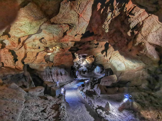 istock cave carved by water with colorful lighting 2137582670