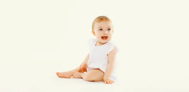 istock Happy cute baby crawling on the floor on white studio background 2137595297