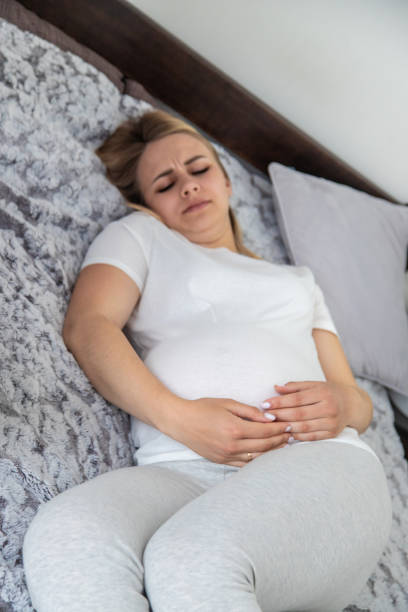 istock Pregnant woman has stomach ache. Selective focus. 2137598452