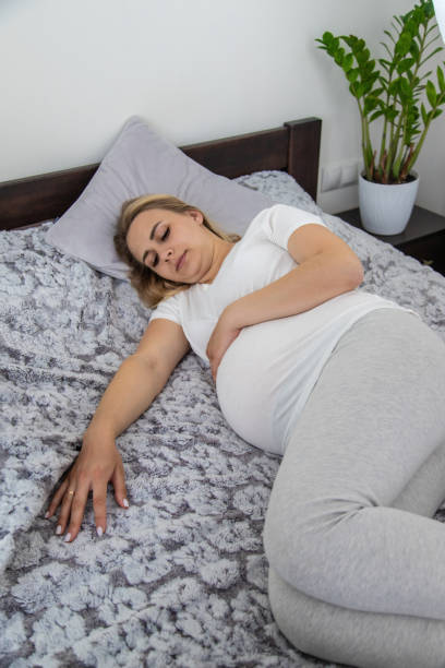 istock Pregnant woman has stomach ache. Selective focus. 2137598467