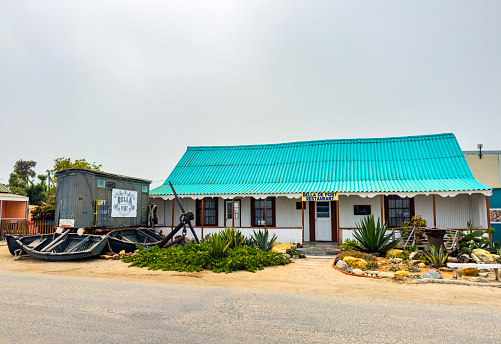 Port Nolloth, South Africa - March 11, 2024: Rustic beachfront bed and breakfast accommodations in small coastal town