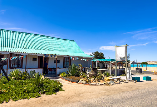 Port Nolloth, South Africa - March 16, 2024: Rustic beachfront bed and breakfast accommodations in small coastal town