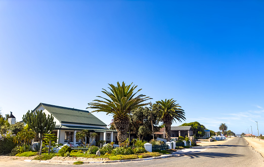 Port Nolloth, South Africa - March 17, 2024: Rustic beachfront bed and breakfast accommodations in small coastal town