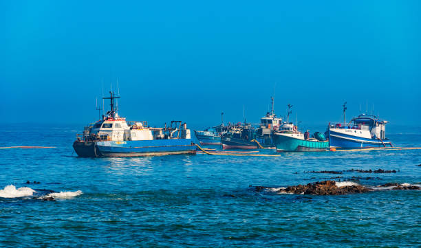 Port Nolloth, South Africa - March 17, 2024: Marine Diamond mining boats in small coastal town
