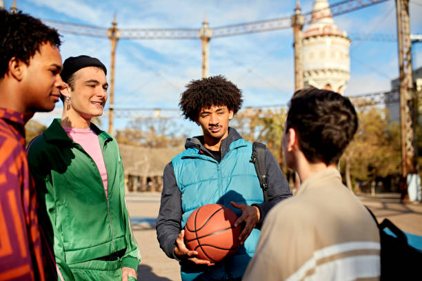 istock Community friends interacting before basketball game 2137631824