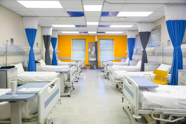 Empty hospital ward with empty hospital beds