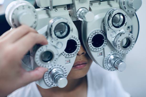 istock Kid eye test in clinic 2137673510