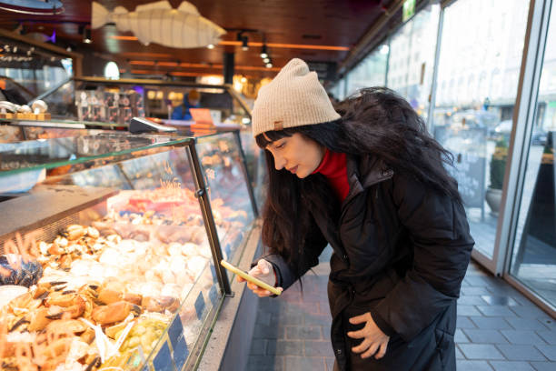 istock Tourist Exploring Bergen's Delights at Fish Market 2137679355