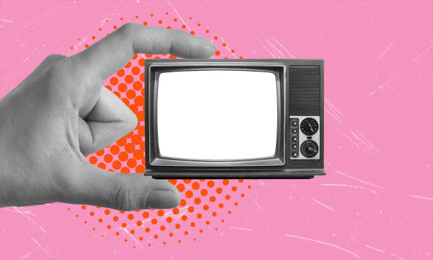 istock Art collage, TV in hand on pink background with copy space. 2137689990