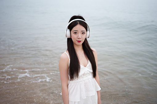 A beautiful woman with headphones