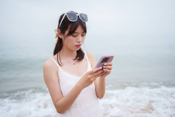 istock young man looking at mobile phone 2137704484