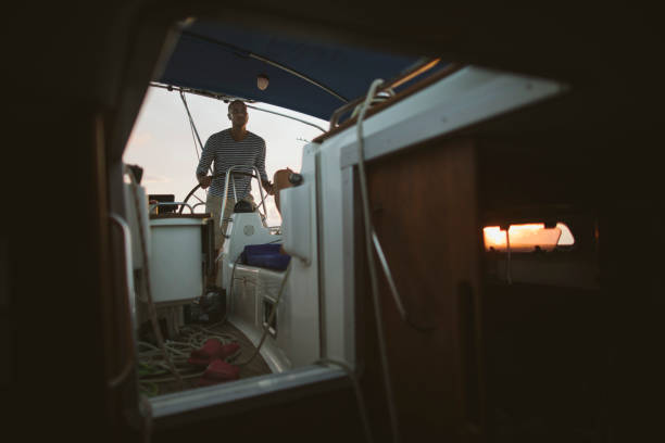 Fisherman portrait at harbor: fishing industry in Italy, in the Mediterranean Sea