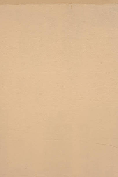 istock Part of a blank beige concrete wall 2137726929