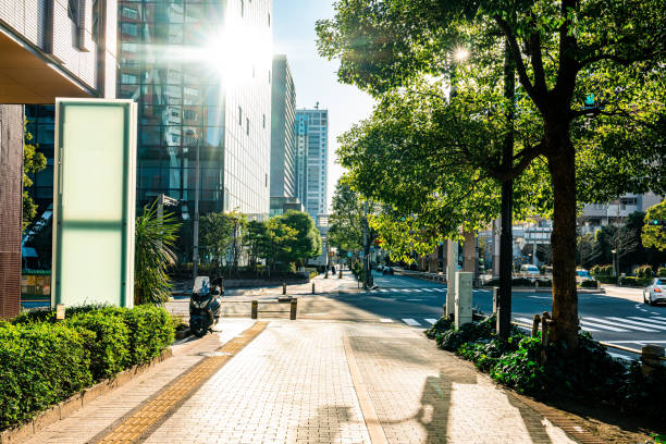 Modern buildings in downtown of Tokyo on view from empty footpath