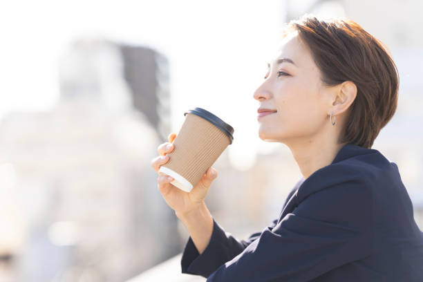 A woman is taking a break on the rooftop.