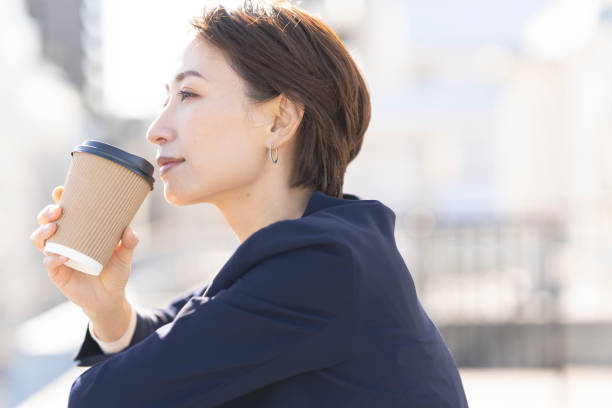 istock A woman is taking a break on the rooftop. 2137921957