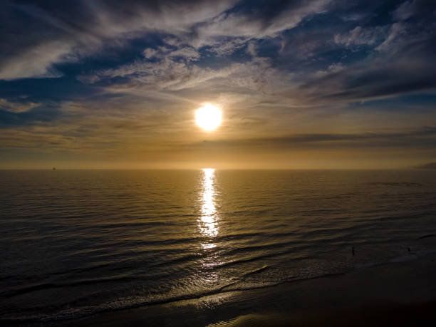 istock Golden Sunset on the Ocean 2137938236