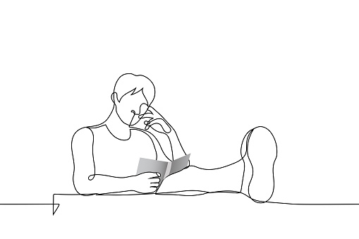 man reading sitting with his feet on the table - one line drawing vector. concept read a paper book at the table