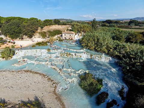 View of pools and waterfalls in Saturnia hot springs, Tuscany, Italy