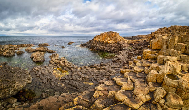 istock Hexagonal Basalt columns - Giant's Causeway on Northern Ireland Shore 2137999845