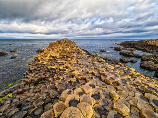 istock Hexagonal Basalt columns - Giant's Causeway on Northern Ireland Shore 2138003017