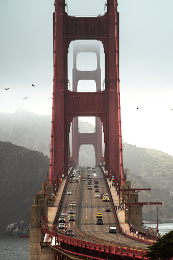 Photo of the Golden Gate Bridge in cloudy weather taken from the overlook in San Francisco