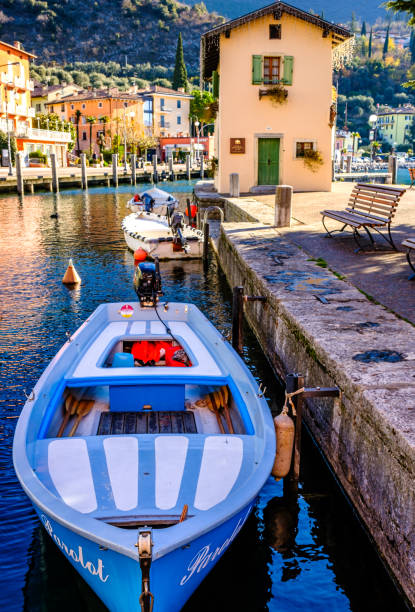 Torbole, Italy - December 14: port and boats of Torbole at December 14, 2023
